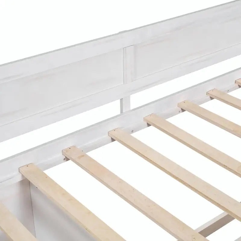 Lit de repos avec tiroirs de rangement et étagères