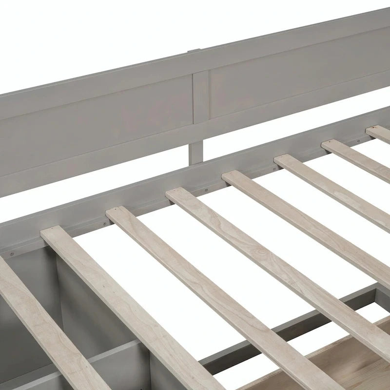 Lit de repos avec tiroirs de rangement et étagères